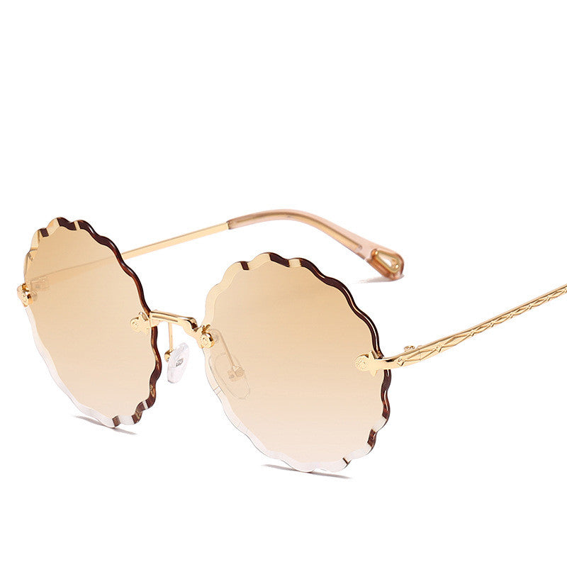 Lady Round Rimless Sunglasses With Diamond Cut Lens